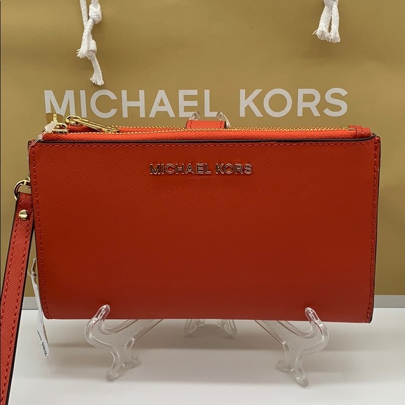 Michael Kors Handbags - MICHAEL KORS JET SET TRAVEL LG DOUBLE ZIP WRISTLET
